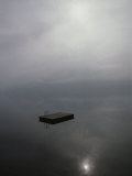 A Swimming Dock Seems to Float in Mid-Air Instead of on Placid Waters