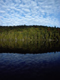 Shoreline and Clouds Reflected in the Still Waters of Rainbow Lake