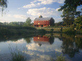 An Old Red Barn Reflected in a Pond