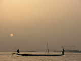 Men Fishing from a Boat at Sunset on the Niger River