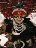 A Tribal Woman Decorated with Beads  Feathers  and Cowries