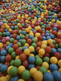 A Rainbow-Colored Landslide of Toy Balls in Abstract Patterns