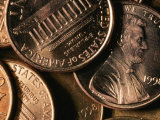 Close View of Several Pennies Dated 1998