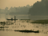 Fishermen Drift Along the Bank of the Nile as Twilight Falls