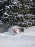 A Snowmobiler Spins Through Deep Powder