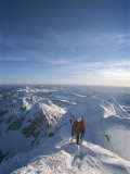 A Man Summits a Mountain in Grand Teton National Park  Wyoming
