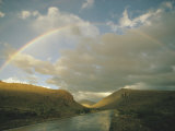A Rainbow Arches over a Road in Mexico