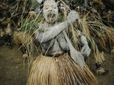 A Dancer at Annual Tribal Sing-Sing Demonstrates the Mourning Ritual of Covering Her Body in Ash