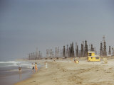 Beach Scene with Oil Rigs in the Background