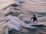 A Surfer Catches a Wave in Southern California