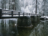 A Snow-Covered Footbridge Spanning the Merced River