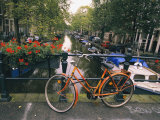 The Keizersgracht Canal  with Potted Flowers and a Bicycle in the Foreground