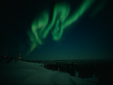 The Aurora Borealis Creates Fantastic Patterns Across the Evening Sky