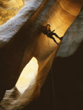 Man Rappelling Down a Canyon in Zion National Park