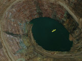Aerial View of an Ultralight Plane Flying over a Mine