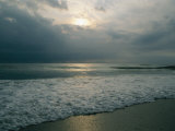 Dramatic View of a Stormy Sunrise and the Foamy Surf