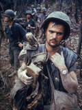 Dirty  Exhausted Looking US Marine on Patrol with His Squad Near the DMZ During the Vietnam War
