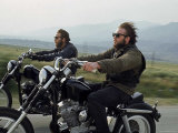 Hell's Angels Riding Motorcycles on Road