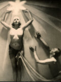 Half Naked Man and Woman During a Performance at the French Music Hall  the Folies Bergere