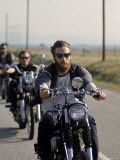 Hell's Angels Riding Motorcycles on Road