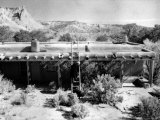 Georgia O'Keeffe Climbing a Ladder Outside Ghost Ranch  Her Desert Home