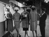 5 Models Wearing Fashionable Dress Suits at a Race Track Betting Window  at Roosevelt Raceway