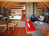 Interior of a Prefabricated House on Block Island with Living Room Area  Fireplace and Kitchen