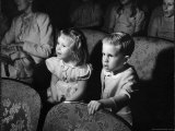 Children Watching Cartoons in a Movie Theater