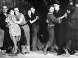 Construction Workers and Taxi Dancers Enjoying a Night Out in Barroom in Frontier Town