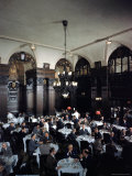 Diners in the Oak Room at the Plaza Hotel
