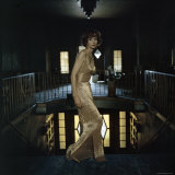 Model Wearing Gold Beaded Sheath Gown by Designer Helen Rose