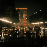 Night Time Traffic Streaming Down the Champs Elysees with the Arc de Triomphe in Background