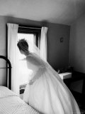 Bride Prepares For Wedding  in Traditional White Gown  19th Century Wedding Dress