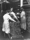 Black Women Laborers Weighing Wire Coils and Recording Weights to Establish Wage Rates  in Factory