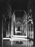 Magnificently Decorated Columns and Arches in an Arcade at the Alhambra Palace