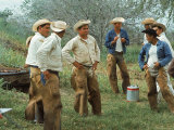Cowboys on the King Ranch Stand Around During a Break from Rounding Up Cattle