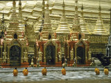 Buddhist Monks Praying at Shwe Dagon Pagoda