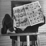 Man Reading the Comics Section of the Detroit Times on a Typical Sunday During WWII