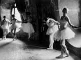 Ballerinas at Barre Against Round Windows During Rehearsal For "Swan Lake" at Grand Opera de Paris