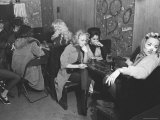 Girlfriends of Hell's Angels Members Sitting Away From Hell's Angels in Separate Part of the Bar