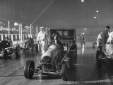 Jeep Pushing a Midget Auto to Start It For a Race