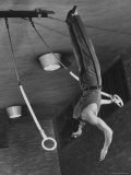 Intercollegiate Champion Gymnast Newt Loken on Flying Rings Doing Reverse Flyaway with Half Twist