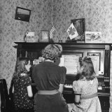 Patricia Colleen Altree Playing the Piano with Her Two Sisters