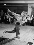 Bob Jones Bowling with a Cigar Hanging Out of His Mouth