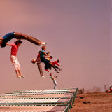 People Bouncing on Trampolines at Trampoline Center