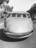 Four Men Driving Down Street in Davis Motorcar Three Wheeled Car