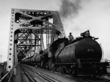 Long String of Tank Cars Rumbling Across the 4 1/2 Mile Huey Long Bridge at New Orleans