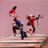 People Bouncing on Trampolines at Trampoline Center