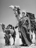 Arab Soldiers Standing Guard with Their Camels