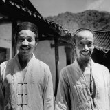 Taoist Priests Standing Outside Their Temple